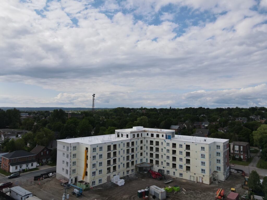 Multi-storey residential building in Sault Ste. Marie with a PVC roof installed by OYH Roofing