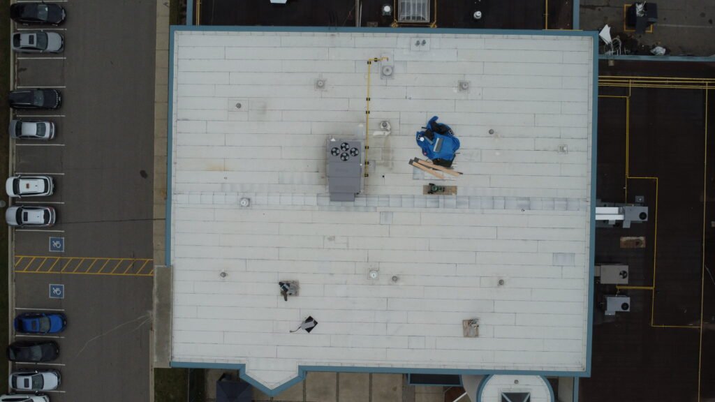 Top-down drone view of the City of Mississauga building at 3185 Mavis Rd, where OYH Roofing installed IKO 2-ply modified bitumen