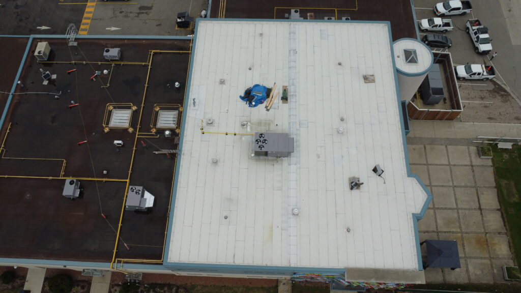 Drone angle of City of Mississauga building at 3185 Mavis Rd with new modified bitumen roofing system installed