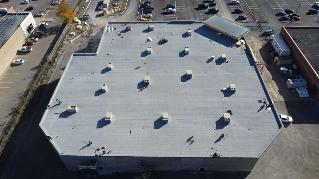 Drone view of commercial building at 777 Niagara St Welland with new modified bitumen roofing system