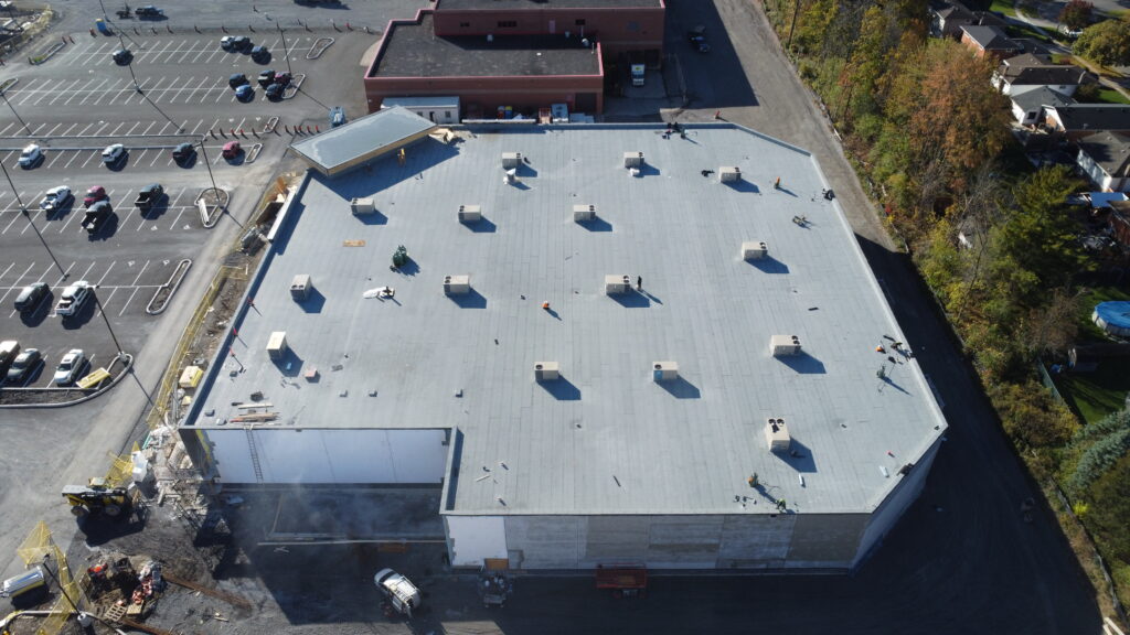 Aerial roof surface detail showing modified bitumen membrane on Welland commercial roofing project