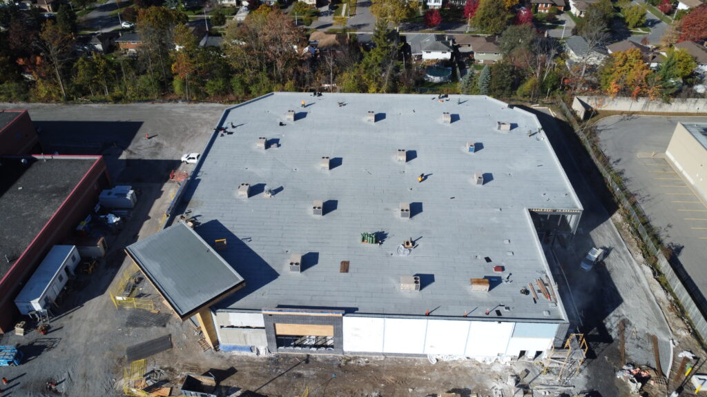 Drone view of 777 Niagara St property showing large commercial roofing project in Welland Ontario